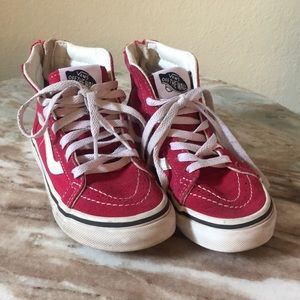 Kids burgundy high top vans.